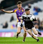 12 February 2022; Daryl Branagan of Kilcoo in action against Andrew McGowan of Kilmacud Crokes during the AIB GAA Football All-Ireland Senior Club Championship Final match between Kilcoo, Down, and Kilmacud Crokes, Dublin, at Croke Park in Dublin. Photo by Piaras Ó Mídheach/Sportsfile