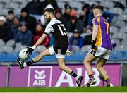 12 February 2022; Conor Laverty of Kilcoo gets away from Dan O'Brien of Kilmacud Crokes during the AIB GAA Football All-Ireland Senior Club Championship Final match between Kilcoo, Down, and Kilmacud Crokes, Dublin, at Croke Park in Dublin. Photo by Piaras Ó Mídheach/Sportsfile