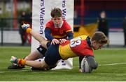 17 February 2022; Marcel Haas of St Fintan's High School scores his side's third try during the Bank of Ireland Fr Godfrey Cup Semi-Final match between St Fintan's High School and CBC Monkstown at Clontarf Rugby Club in Dublin. Photo by Seb Daly/Sportsfile