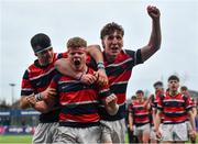 17 February 2022; Wesley College players, from left, Shane Pedlow, Tom Geoghegan and Liam O'Neill celebrate after the Bank of Ireland Leinster Rugby Schools Senior Cup 1st Round match between Cistercian College, Roscrea and Wesley College at Energia Park in Dublin. Photo by David Fitzgerald/Sportsfile