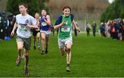 16 February 2022; Alex O'Tuama of Gonzaga College SJ, right, competing in the junior boys' 3000m during the Irish Life Health Leinster Schools Cross Country Championships at Santry Demesne in Dublin. Photo by Sam Barnes/Sportsfile