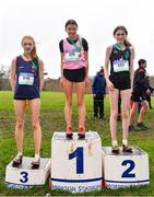 16 February 2022; Junior girls' 2000m medallists, Emily Botton of Mt Sackville, gold, Dearbhla Alan of St Marys Dundalk, silver, and Eimear Cooney of Sacred Heart Drogheda, bronze, during the Irish Life Health Leinster Schools Cross Country Championships at Santry Demesne in Dublin. Photo by Sam Barnes/Sportsfile