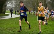 16 February 2022; Harry Bogan of Ratoath College, left, and Donagh Carey of St Finians, competing in the junior boys' 3000m during the Irish Life Health Leinster Schools Cross Country Championships at Santry Demesne in Dublin. Photo by Sam Barnes/Sportsfile