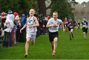 16 February 2022; Jacob Ciomech of HFCS, left, and Rhys Frawley of Presentation College Bray, competing in the minor boys' 2000m during the Irish Life Health Leinster Schools Cross Country Championships at Santry Demesne in Dublin. Photo by Sam Barnes/Sportsfile