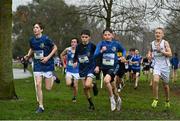 16 February 2022; Athletes from left, Niall McAndrew of Naas CBS, Sean Higgins of Naas CBS, Matthew Galvin of Naas CBS, and Jacob Ciomech of HFCS, competing in the minor boys' 2000m during the Irish Life Health Leinster Schools Cross Country Championships at Santry Demesne in Dublin. Photo by Sam Barnes/Sportsfile
