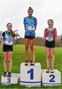 16 February 2022; Minor girl's 1500m medallists, Sholah Laurane of Green Hills, gold, Eabhadh Multaney-Kelly of Sacred Heart Tullamore, silver, and Clodagh O'Callaghan of Presentation Kilkenny, bronze, during the Irish Life Health Leinster Schools Cross Country Championships at Santry Demesne in Dublin. Photo by Sam Barnes/Sportsfile