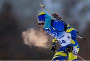 18 February 2022; Artem Pryma of Ukraine during the Men's 15km Mass Start event on day 14 of the Beijing 2022 Winter Olympic Games at National Biathlon Centre in Zhangjiakou, China. Photo by Ramsey Cardy/Sportsfile