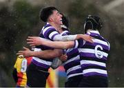 18 February 2022; Yago Fernandez Vilar of Terenure College, left, celebrates with teammates after he scored their side's second try during the Bank of Ireland Leinster Rugby Schools Senior Cup 1st Round match between Terenure College and St Fintan’s High School at Castle Avenue in Dublin. Photo by David Fitzgerald/Sportsfile