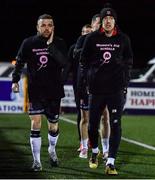 18 February 2022; Keith Ward, left, and David McMillan of Dundalk wear a shirt in support of Women's Aid Dundalk in the warm-up before the SSE Airtricity League Premier Division match between Dundalk and Derry City at Oriel Park in Dundalk, Louth. Photo by Ben McShane/Sportsfile