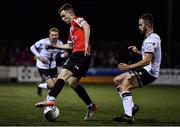 18 February 2022; Brandon Kavanagh of Derry City in action against Robbie Benson of Dundalk during the SSE Airtricity League Premier Division match between Dundalk and Derry City at Oriel Park in Dundalk, Louth. Photo by Ben McShane/Sportsfile