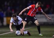 18 February 2022; Joe Adams of Dundalk in action against Cameron Dummigan of Derry City during the SSE Airtricity League Premier Division match between Dundalk and Derry City at Oriel Park in Dundalk, Louth. Photo by Ben McShane/Sportsfile
