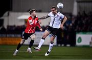 18 February 2022; Mark Connolly of Dundalk in action against Jamie McGonigle of Derry City during the SSE Airtricity League Premier Division match between Dundalk and Derry City at Oriel Park in Dundalk, Louth. Photo by Ben McShane/Sportsfile