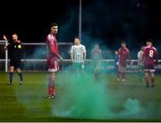 18 February 2022; Cian Coleman of Cork City looks at a smoke bomb on the pitch during the SSE Airtricity League First Division match between Bray Wanderers and Cork City at Carlisle Grounds in Bray, Wicklow. Photo by David Fitzgerald/Sportsfile