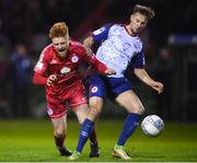 18 February 2022; Aodh Dervin of Shelbourne is tackled by Billy King of St Patrick's Athletic during the SSE Airtricity League Premier Division match between Shelbourne and St Patrick's Athletic at Tolka Park in Dublin. Photo by Stephen McCarthy/Sportsfile