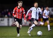 18 February 2022; Jamie McGonigle of Derry City and Paul Doyle of Dundalk during the SSE Airtricity League Premier Division match between Dundalk and Derry City at Oriel Park in Dundalk, Louth. Photo by Ben McShane/Sportsfile