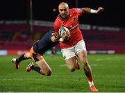 18 February 2022; Simon Zebo of Munster runs in his second, and his side's third, try despite the efforts of Emiliano Boffelli of Edinburgh during the United Rugby Championship match between Munster and Edinburgh at Thomond Park in Limerick. Photo by Brendan Moran/Sportsfile