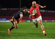 18 February 2022; Simon Zebo of Munster runs in his second, and his side's third, try despite the efforts of Emiliano Boffelli of Edinburgh during the United Rugby Championship match between Munster and Edinburgh at Thomond Park in Limerick. Photo by Brendan Moran/Sportsfile