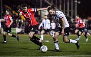 18 February 2022; Robbie Benson of Dundalk in action against Eoin Toal of Derry City during the SSE Airtricity League Premier Division match between Dundalk and Derry City at Oriel Park in Dundalk, Louth. Photo by Ben McShane/Sportsfile