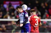 18 February 2022; Jason McClelland of St Patrick's Athletic in action against Conor Kane of Shelbourne during the SSE Airtricity League Premier Division match between Shelbourne and St Patrick's Athletic at Tolka Park in Dublin. Photo by Sam Barnes/Sportsfile