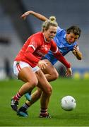 19 February 2022; Katie Quirke of Cork is tackled by Leah Caffrey of Dublin during the Lidl Ladies Football National League Division 1 match between Dublin and Cork at Croke Park in Dublin. Photo by Ray McManus/Sportsfile