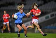 19 February 2022; Siobhán Killeen of Dublin is tackled by Dara Kinry of Cork during the Lidl Ladies Football National League Division 1 match between Dublin and Cork at Croke Park in Dublin. Photo by Ray McManus/Sportsfile