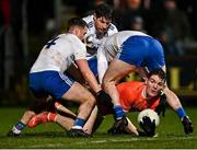 19 February 2022; Jarly Óg Burns of Armagh in action against Monaghan players, from left, Ryan Wylie, Darren Hughes and Conor Boyle during the Allianz Football League Division 1 match between Armagh and Monaghan at Athletic Grounds in Armagh. Photo by Piaras Ó Mídheach/Sportsfile