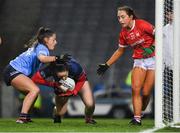 19 February 2022; Cork goalkeeper Martina O'Brien, supported by teammate Sarah Leahy, right, is tackled by Siobhán Woods of Dublin during the Lidl Ladies Football National League Division 1 match between Dublin and Cork at Croke Park in Dublin. Photo by Ray McManus/Sportsfile