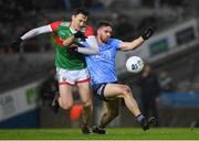 19 February 2022; Seán MacMahon of Dublin is tackled by Diarmuid O’Connor of Mayo during the Allianz Football League Division 1 match between Dublin and Mayo at Croke Park in Dublin. Photo by Ray McManus/Sportsfile