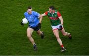 19 February 2022; Brian Fenton of Dublin in action against Matthew Ruane of Mayo during the Allianz Football League Division 1 match between Dublin and Mayo at Croke Park in Dublin. Photo by Stephen McCarthy/Sportsfile