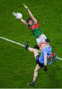 19 February 2022; Lee Gannon of Dublin is blocked by Rory Brickenden of Mayo during the Allianz Football League Division 1 match between Dublin and Mayo at Croke Park in Dublin. Photo by Stephen McCarthy/Sportsfile