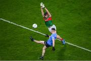 19 February 2022; Lee Gannon of Dublin is blocked by Rory Brickenden of Mayo during the Allianz Football League Division 1 match between Dublin and Mayo at Croke Park in Dublin. Photo by Stephen McCarthy/Sportsfile