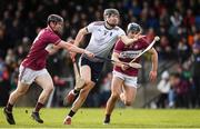 19 February 2022; Gearoid O'Connor of University of Limerick in action against Conor Caulfield and Daniel Loftus of NUI Galway during the Electric Ireland HE GAA Fitzgibbon Cup Final match between NUI Galway and University of Limerick at IT Carlow in Carlow. Photo by Matt Browne/Sportsfile