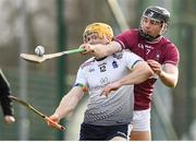19 February 2022; Brian O'Grady of University of Limerick in action against Mark Gill of NUI Galway during the Electric Ireland HE GAA Fitzgibbon Cup Final match between NUI Galway and University of Limerick at IT Carlow in Carlow.  Photo by Matt Browne/Sportsfile