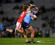 19 February 2022; Siobhán Killeen of Dublin is tackled by Dara Kinry of Cork during the Lidl Ladies Football National League Division 1 match between Dublin and Cork at Croke Park in Dublin. Photo by Ray McManus/Sportsfile