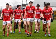 20 February 2022; Cork players leave the pitch after the Allianz Football League Division 2 match between Derry and Cork at Derry GAA Centre of Excellence in Owenbeg, Derry. Photo by Sam Barnes/Sportsfile