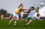 20 February 2022; Dean McGovern of Leitrim in action against Liam Gallagher and Nathan McElwaine of London during the Allianz Football League Division 4 match between Leitrim and London at Connacht GAA Centre of Excellence in Bekan, Mayo. Photo by Ben McShane/Sportsfile
