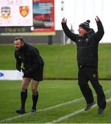 20 February 2022; Down manager James McCartan reacts late in the game, as linesman Anthony Nolan looks on, during the Allianz Football League Division 2 match between Meath and Down at Pairc Táilteann in Navan, Meath. Photo by Stephen McCarthy/Sportsfile