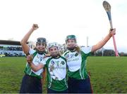 20 February 2022; Sarsfields players, from left, Niamh McGrath, Joanne Daly and Maria Cooney celebrate after the AIB All-Ireland Senior Camogie Club Championship Semi-Final match between Sarsfields and Slaughtneil at Naomh Eanna in Gorey, Wexford. Photo by Matt Browne/Sportsfile