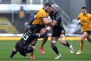 20 February 2022; Stuart McCloskey of Ulster is tackled by Adam Warren and Ollie Griffiths of Dragons during the United Rugby Championship match between Dragons and Ulster at Rodney Parade in Newport, Wales. Photo by Ben Evans/Sportsfile