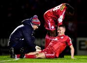 18 February 2022; Jack Moylan of Shelbourne receives medical attention during the SSE Airtricity League Premier Division match between Shelbourne and St Patrick's Athletic at Tolka Park in Dublin. Photo by Sam Barnes/Sportsfile