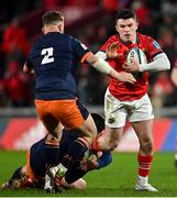 18 February 2022; Calvin Nash of Munster in action against Adam McBurney of Edinburgh during the United Rugby Championship match between Munster and Edinburgh at Thomond Park in Limerick. Photo by Brendan Moran/Sportsfile