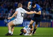 19 February 2022; Harry Byrne of Leinster is tackled by Kieran Williams and Michael Collins of Ospreys during the United Rugby Championship match between Leinster and Ospreys at RDS Arena in Dublin. Photo by Brendan Moran/Sportsfile