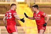 20 February 2022; Darren McCurry of Tyrone, right, is congratulated by teammate Cathal McShane after scoring their side's second goal during the Allianz Football League Division 1 match between Tyrone and Kildare at O'Neill's Healy Park in Omagh, Tyrone. Photo by Seb Daly/Sportsfile