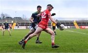 20 February 2022; Richard Donnelly of Tyrone in action against Mick O’Grady of Kildare during the Allianz Football League Division 1 match between Tyrone and Kildare at O'Neill's Healy Park in Omagh, Tyrone. Photo by Seb Daly/Sportsfile