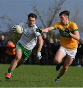 20 February 2022; Liam Gallagher of London is tackled by Pearce Dolan of Leitrim during the Allianz Football League Division 4 match between Leitrim and London at Connacht GAA Centre of Excellence in Bekan, Mayo. Photo by Ray McManus/Sportsfile