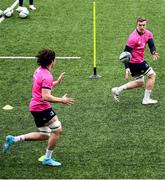 21 February 2022; Dan Leavy offloads to Alex Soroka during a Leinster Rugby squad training session at Energia Park in Dublin. Photo by Harry Murphy/Sportsfile