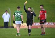 20 February 2022; Jason Scully of Meath is shown a yellow card by referee Noel Mooney during the Allianz Football League Division 2 match between Meath and Down at Pairc Táilteann in Navan, Meath. Photo by Stephen McCarthy/Sportsfile
