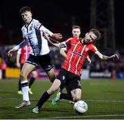 18 February 2022; Cameron Dummigan of Derry City and Steven Bradley of Dundalk during the SSE Airtricity League Premier Division match between Dundalk and Derry City at Oriel Park in Dundalk, Louth. Photo by Ben McShane/Sportsfile