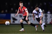 18 February 2022; Brandon Kavanagh of Derry City and Joe Adams of Dundalk during the SSE Airtricity League Premier Division match between Dundalk and Derry City at Oriel Park in Dundalk, Louth. Photo by Ben McShane/Sportsfile
