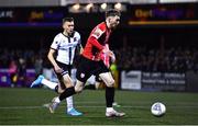 18 February 2022; Jamie McGonigle of Derry City and Lewis Macari of Dundalk during the SSE Airtricity League Premier Division match between Dundalk and Derry City at Oriel Park in Dundalk, Louth. Photo by Ben McShane/Sportsfile